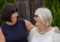 Libby and Rosie Cupitt looking at each other and laughing 