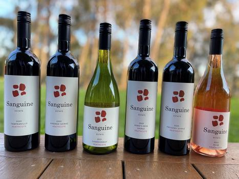 Sanguine Estate bottles and wine service at the cellar door